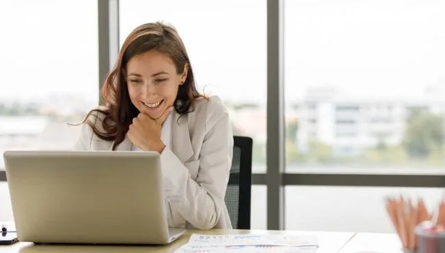 a woman working on a laptop